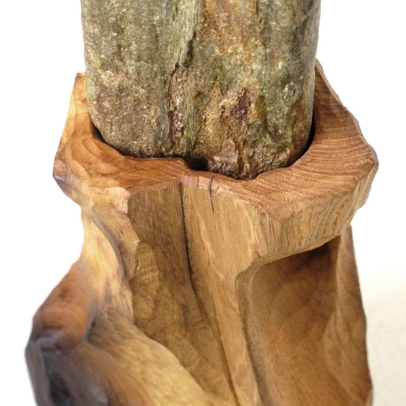 escultura madera y piedra