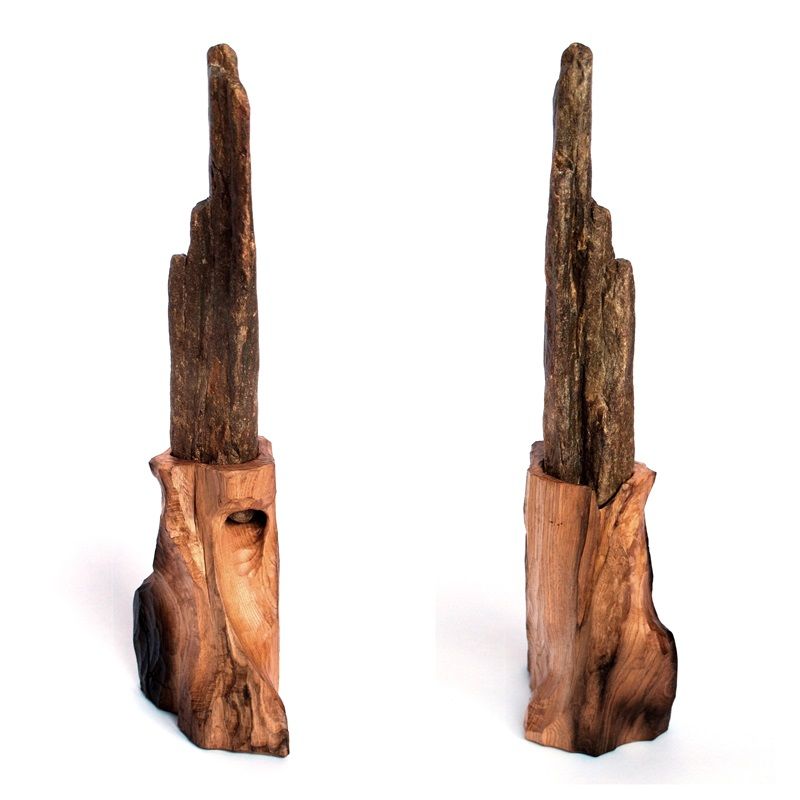escultura madera y piedra